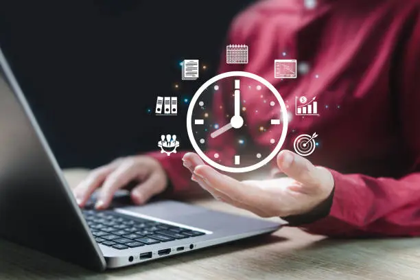 Time and business management target, Time reduce concept, Business Woman show virtual clock in hand.